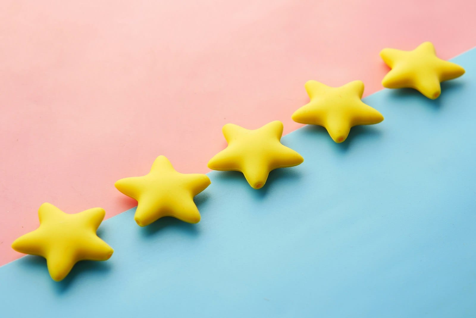 A row of yellow star rating icons, representing customer feedback and reviews